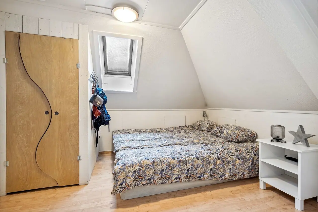 Sleeping alcove and storage room.